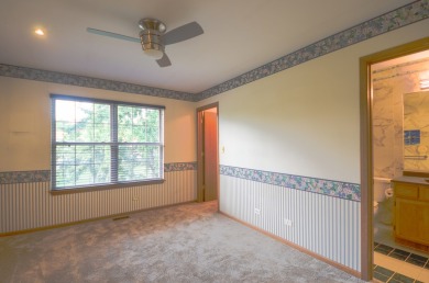 ENJOY A $5,000 CREDIT FOR CARPET REPLACEMENT! This is a on Bloomingdale Golf Club in Illinois - for sale on GolfHomes.com, golf home, golf lot