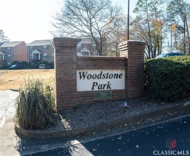 End unit condo available for immediate occupancy overlooking on University of Georgia Golf Course in Georgia - for sale on GolfHomes.com, golf home, golf lot