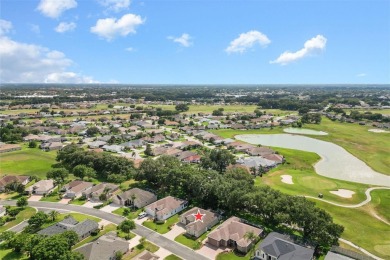 This lovely expanded 3/2 Dogwood designer home in the sought on Stonecrest Golf and Club Club in Florida - for sale on GolfHomes.com, golf home, golf lot