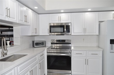 Totally remodeled,  new look,  spacious and beautiful  2/2 FIRST on Flamingo Lakes Country Club in Florida - for sale on GolfHomes.com, golf home, golf lot
