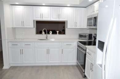 Totally remodeled,  new look,  spacious and beautiful  2/2 FIRST on Flamingo Lakes Country Club in Florida - for sale on GolfHomes.com, golf home, golf lot