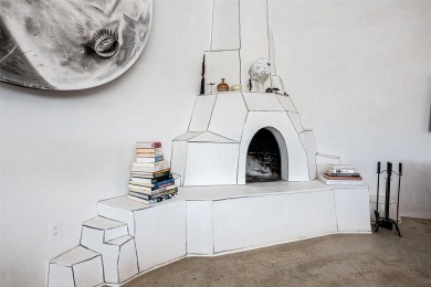 Live inside a work of art in this Artist's Dream Dwelling in on Taos Country Club in New Mexico - for sale on GolfHomes.com, golf home, golf lot