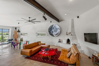 Live inside a work of art in this Artist's Dream Dwelling in on Taos Country Club in New Mexico - for sale on GolfHomes.com, golf home, golf lot