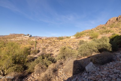 Nestled in a serene, gated community on a elevated lot on Gold Canyon Golf Resort - Dinosaur Mountain in Arizona - for sale on GolfHomes.com, golf home, golf lot