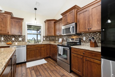 Score a hole in one with this luxurious, low-maintenance home on  in Kansas - for sale on GolfHomes.com, golf home, golf lot