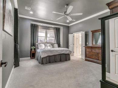 Blending elegance with everyday comfort, this stunning home is on Oak Tree National Golf and Country Club in Oklahoma - for sale on GolfHomes.com, golf home, golf lot