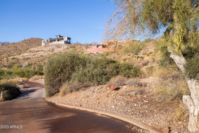 Nestled in a serene, gated community on a elevated lot on Gold Canyon Golf Resort - Dinosaur Mountain in Arizona - for sale on GolfHomes.com, golf home, golf lot