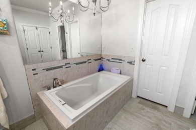 Set on a beautifully landscaped lot with mature trees and on Blackmoor Golf Club in South Carolina - for sale on GolfHomes.com, golf home, golf lot