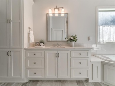 Blending elegance with everyday comfort, this stunning home is on Oak Tree National Golf and Country Club in Oklahoma - for sale on GolfHomes.com, golf home, golf lot