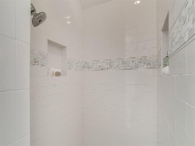 Blending elegance with everyday comfort, this stunning home is on Oak Tree National Golf and Country Club in Oklahoma - for sale on GolfHomes.com, golf home, golf lot