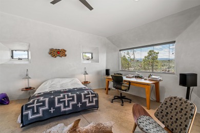 Live inside a work of art in this Artist's Dream Dwelling in on Taos Country Club in New Mexico - for sale on GolfHomes.com, golf home, golf lot