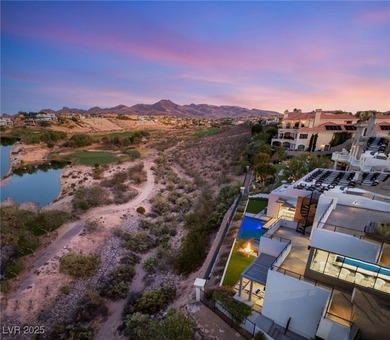 Built by Blue Heron, this modern architectural masterpiece in on Rio Secco Golf Club in Nevada - for sale on GolfHomes.com, golf home, golf lot