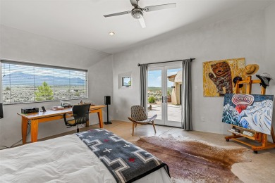 Live inside a work of art in this Artist's Dream Dwelling in on Taos Country Club in New Mexico - for sale on GolfHomes.com, golf home, golf lot