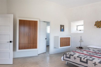 Live inside a work of art in this Artist's Dream Dwelling in on Taos Country Club in New Mexico - for sale on GolfHomes.com, golf home, golf lot