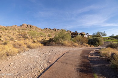 Nestled in a serene, gated community on a elevated lot on Gold Canyon Golf Resort - Dinosaur Mountain in Arizona - for sale on GolfHomes.com, golf home, golf lot