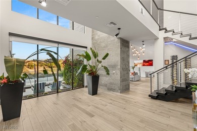 Built by Blue Heron, this modern architectural masterpiece in on Rio Secco Golf Club in Nevada - for sale on GolfHomes.com, golf home, golf lot