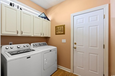 Set on a beautifully landscaped lot with mature trees and on Blackmoor Golf Club in South Carolina - for sale on GolfHomes.com, golf home, golf lot