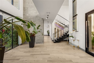 Built by Blue Heron, this modern architectural masterpiece in on Rio Secco Golf Club in Nevada - for sale on GolfHomes.com, golf home, golf lot