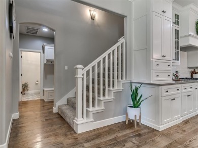 Blending elegance with everyday comfort, this stunning home is on Oak Tree National Golf and Country Club in Oklahoma - for sale on GolfHomes.com, golf home, golf lot
