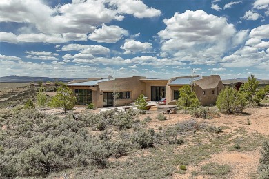 Live inside a work of art in this Artist's Dream Dwelling in on Taos Country Club in New Mexico - for sale on GolfHomes.com, golf home, golf lot