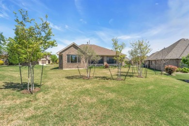 This beautiful fully bricked Briscoe model on a premium on Wildhorse Golf Club of Robson Ranch in Texas - for sale on GolfHomes.com, golf home, golf lot