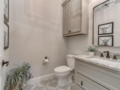 Blending elegance with everyday comfort, this stunning home is on Oak Tree National Golf and Country Club in Oklahoma - for sale on GolfHomes.com, golf home, golf lot