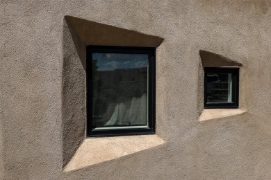Live inside a work of art in this Artist's Dream Dwelling in on Taos Country Club in New Mexico - for sale on GolfHomes.com, golf home, golf lot