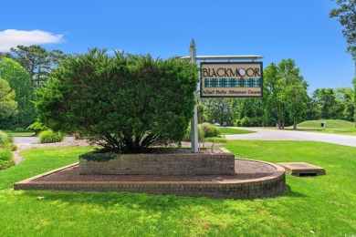 Set on a beautifully landscaped lot with mature trees and on Blackmoor Golf Club in South Carolina - for sale on GolfHomes.com, golf home, golf lot