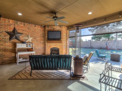 Blending elegance with everyday comfort, this stunning home is on Oak Tree National Golf and Country Club in Oklahoma - for sale on GolfHomes.com, golf home, golf lot