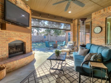 Blending elegance with everyday comfort, this stunning home is on Oak Tree National Golf and Country Club in Oklahoma - for sale on GolfHomes.com, golf home, golf lot