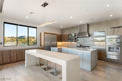 Built by Blue Heron, this modern architectural masterpiece in on Rio Secco Golf Club in Nevada - for sale on GolfHomes.com, golf home, golf lot