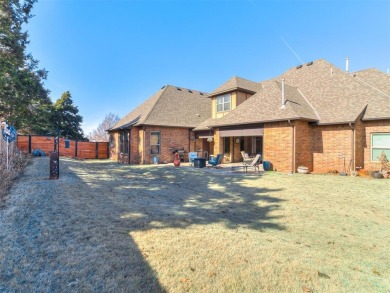 Blending elegance with everyday comfort, this stunning home is on Oak Tree National Golf and Country Club in Oklahoma - for sale on GolfHomes.com, golf home, golf lot