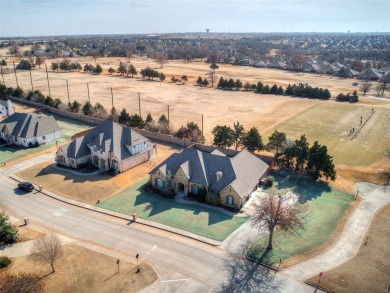 Blending elegance with everyday comfort, this stunning home is on Oak Tree National Golf and Country Club in Oklahoma - for sale on GolfHomes.com, golf home, golf lot