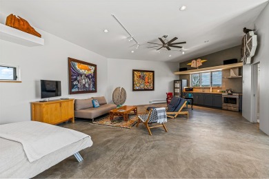 Live inside a work of art in this Artist's Dream Dwelling in on Taos Country Club in New Mexico - for sale on GolfHomes.com, golf home, golf lot