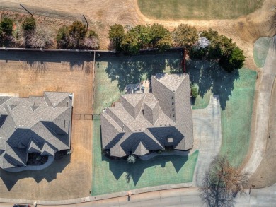 Blending elegance with everyday comfort, this stunning home is on Oak Tree National Golf and Country Club in Oklahoma - for sale on GolfHomes.com, golf home, golf lot