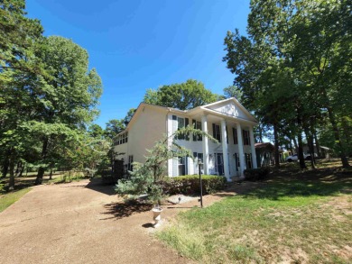 Welcome to a market this Colonial-style home that has a timeless on Indian Hills Country Club in Arkansas - for sale on GolfHomes.com, golf home, golf lot