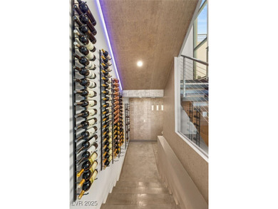 Built by Blue Heron, this modern architectural masterpiece in on Rio Secco Golf Club in Nevada - for sale on GolfHomes.com, golf home, golf lot