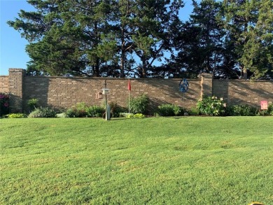 Blending elegance with everyday comfort, this stunning home is on Oak Tree National Golf and Country Club in Oklahoma - for sale on GolfHomes.com, golf home, golf lot