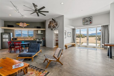 Live inside a work of art in this Artist's Dream Dwelling in on Taos Country Club in New Mexico - for sale on GolfHomes.com, golf home, golf lot