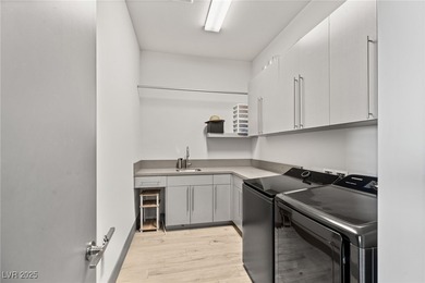 Built by Blue Heron, this modern architectural masterpiece in on Rio Secco Golf Club in Nevada - for sale on GolfHomes.com, golf home, golf lot