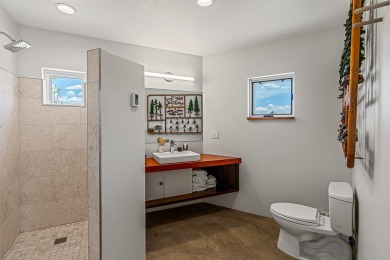 Live inside a work of art in this Artist's Dream Dwelling in on Taos Country Club in New Mexico - for sale on GolfHomes.com, golf home, golf lot