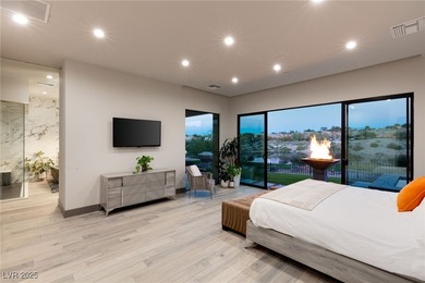 Built by Blue Heron, this modern architectural masterpiece in on Rio Secco Golf Club in Nevada - for sale on GolfHomes.com, golf home, golf lot