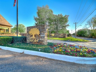 Blending elegance with everyday comfort, this stunning home is on Oak Tree National Golf and Country Club in Oklahoma - for sale on GolfHomes.com, golf home, golf lot
