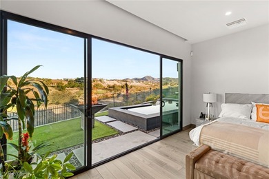 Built by Blue Heron, this modern architectural masterpiece in on Rio Secco Golf Club in Nevada - for sale on GolfHomes.com, golf home, golf lot