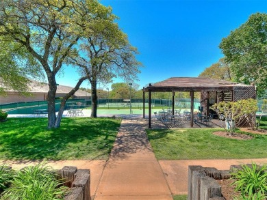 Blending elegance with everyday comfort, this stunning home is on Oak Tree National Golf and Country Club in Oklahoma - for sale on GolfHomes.com, golf home, golf lot