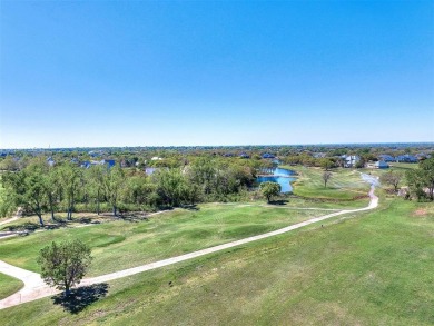 Blending elegance with everyday comfort, this stunning home is on Oak Tree National Golf and Country Club in Oklahoma - for sale on GolfHomes.com, golf home, golf lot