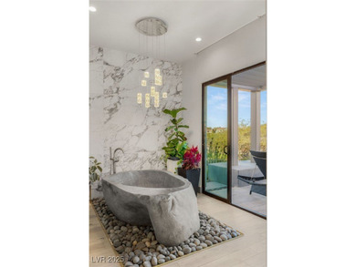 Built by Blue Heron, this modern architectural masterpiece in on Rio Secco Golf Club in Nevada - for sale on GolfHomes.com, golf home, golf lot