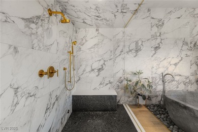 Built by Blue Heron, this modern architectural masterpiece in on Rio Secco Golf Club in Nevada - for sale on GolfHomes.com, golf home, golf lot