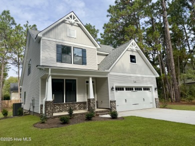 This stunning new 4-bedroom, 2.5-bath home in the gated Woodlake on Woodlake Country Club in North Carolina - for sale on GolfHomes.com, golf home, golf lot