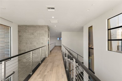 Built by Blue Heron, this modern architectural masterpiece in on Rio Secco Golf Club in Nevada - for sale on GolfHomes.com, golf home, golf lot